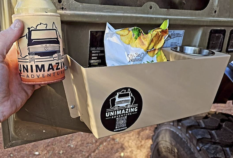 Stuart's metal door pocket with contents